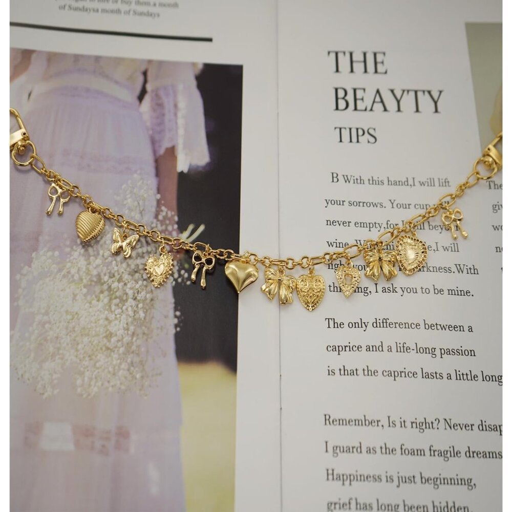 Sophisticated Gold Keychain With Charming Heart A… - image 6